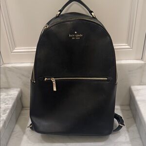 Kate Spade Black Leather Backpack with Gold Accents